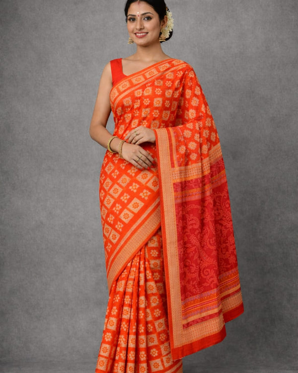 Authentic Sambalpuri Patta Saree – Traditional Handloom Design in Rich Orange